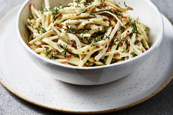 A small white bowl full of remoulade