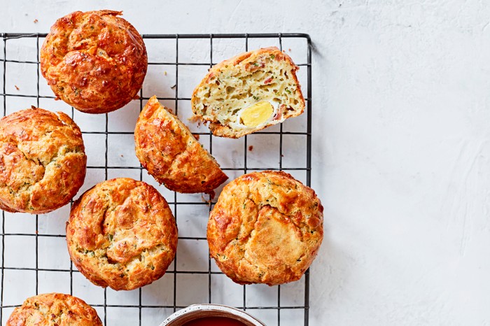 Bacon and egg muffins on a wire rack